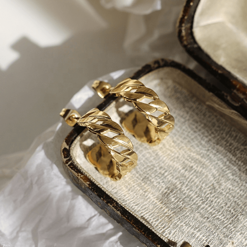 Gold Plated Hollow Chain Earrings Inside of a Jewelry Box